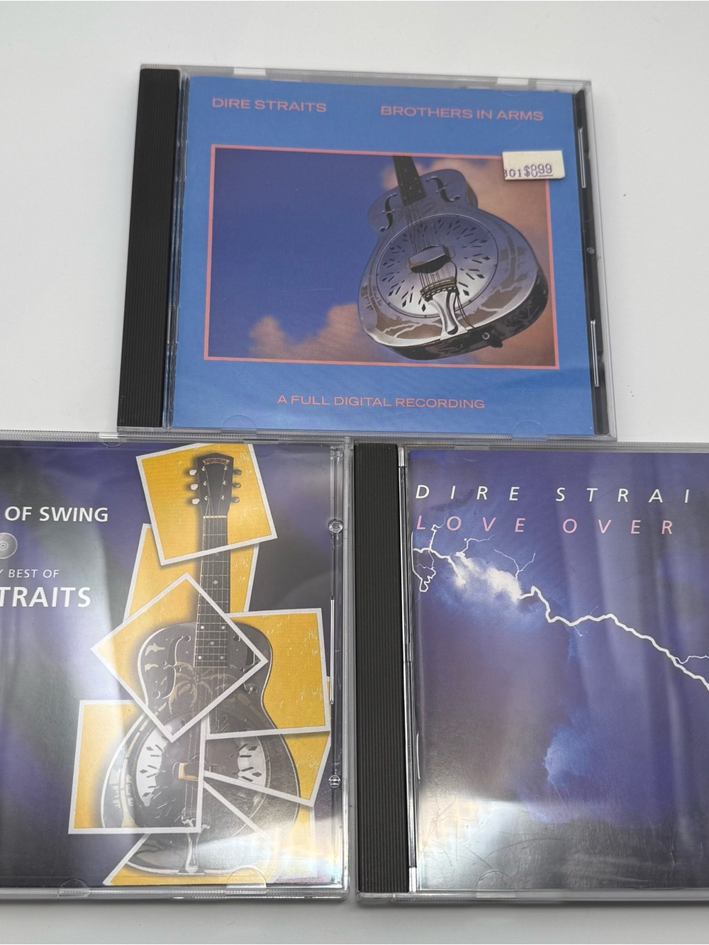 Dire Straits CD Lot: Brothers in Arms, Love Over Gold, and Sultans of Swing